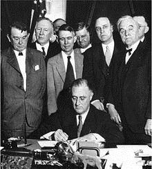 Roosevelt Signs a Document as Part of the WPA